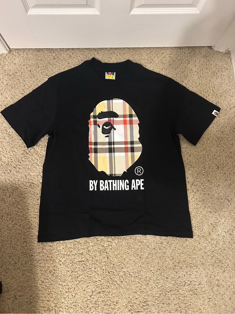 BAPE Graphic Tee with Beige Plaid Ape Logo